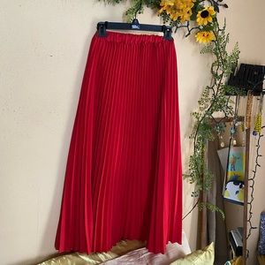Red pleated skirt